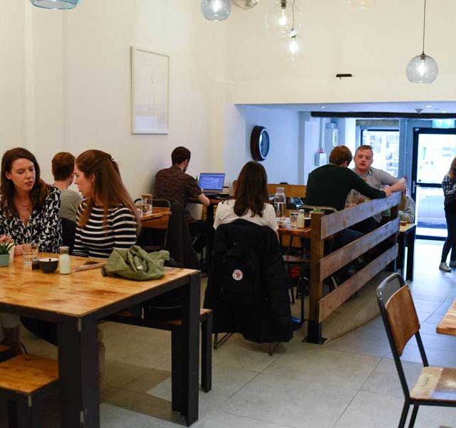 Interior of a busy day in Social Fabric Café